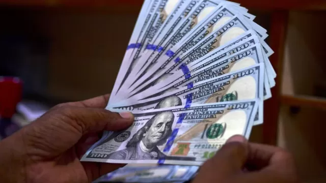 Intervention Threat Slows Dollar's Rise to New High Against the Yen